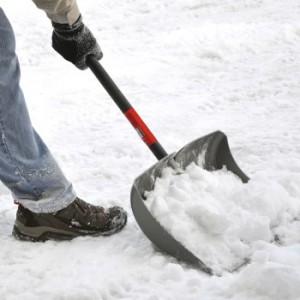 Man shoveling snow after a heavy snowfall
