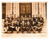 Class photograph of the Architectural Construction senior class of 1925, on the steps of Wentworth Hall.