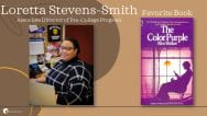 Portrait of Loretta Stevens-Smith, Associate Director of Pre-College Program, at their desk. Their favorite book, The Color Purple, is pictured next to their portrait.
