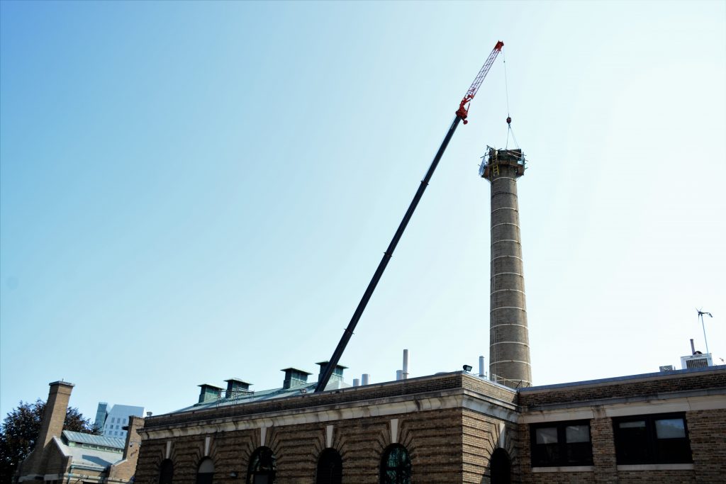 Demolition of the dormant chimney atop Kingman Hall